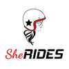 SHE RIDES